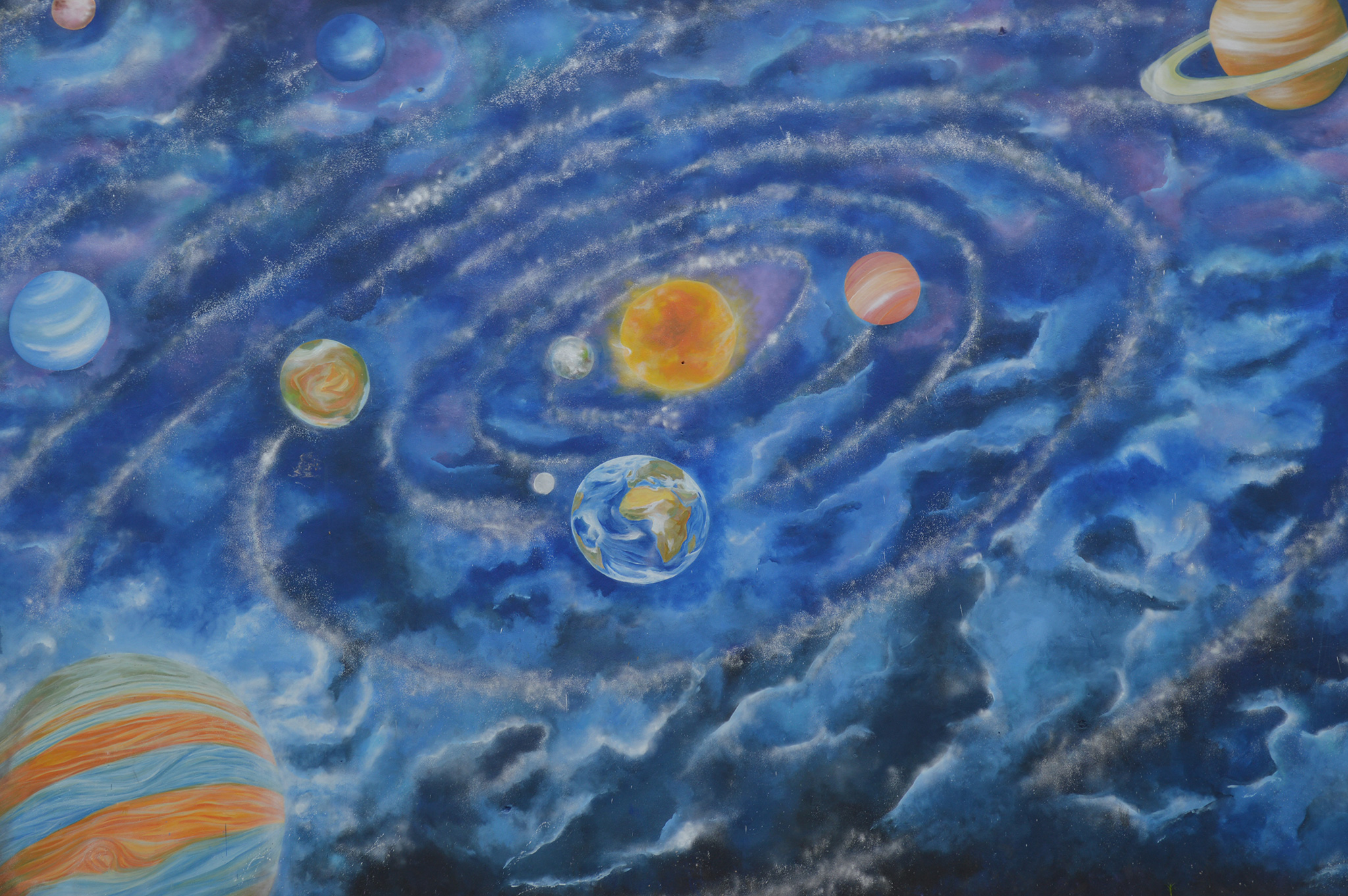 Foto principal mural O sistema